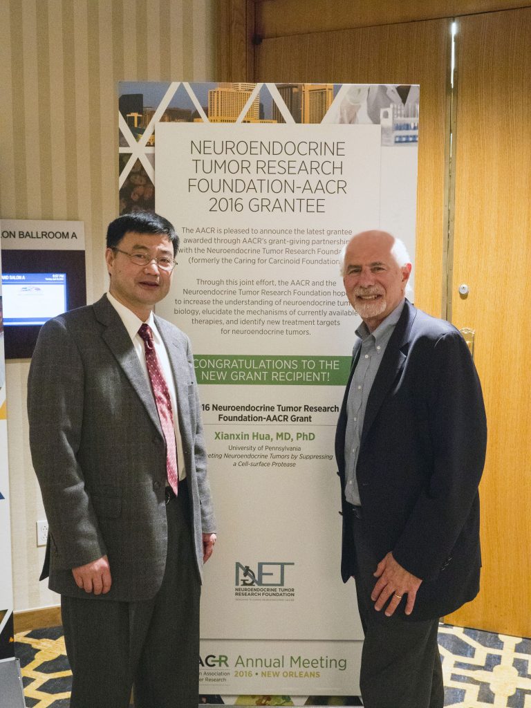 Xianxin Hua, MD, PhD recipient of the NETRF and AACR research grant with Ron Hollander, NETRF Executive Director at the 2016 AACR Annual Meeting © 2016/AACR Todd Buchanan (Edited by NETRF)