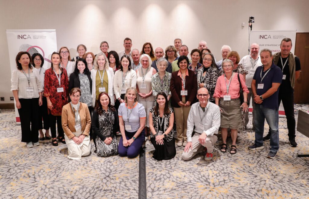 Attendees of INCA summit pose together
